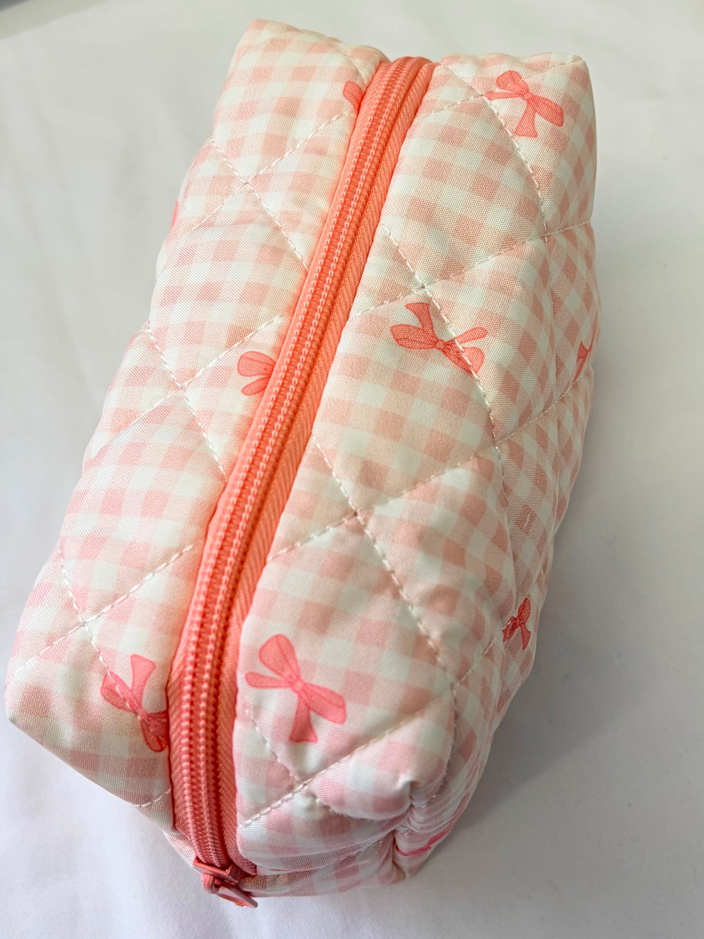 RIBBON POP BOW COSMETIC BAG