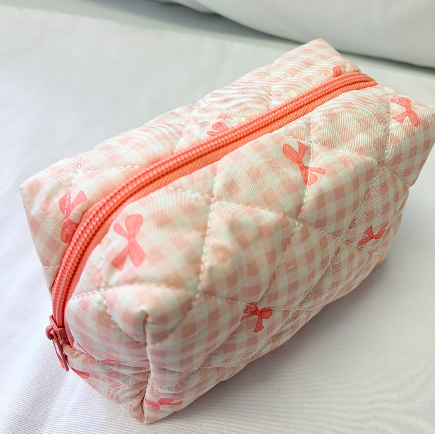 RIBBON POP BOW COSMETIC BAG